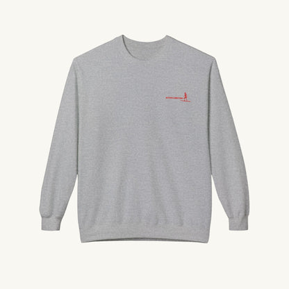 Graues Damen-Sweatshirt mit ein roten Grafik-Print auf der Brust. Der Text und die Silhouette einer Frau, die auf einem Surfbrett steht